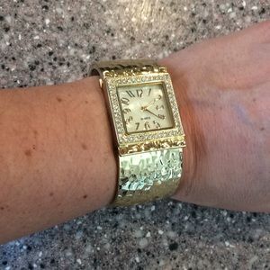 Ladies hammered gold cuff watch